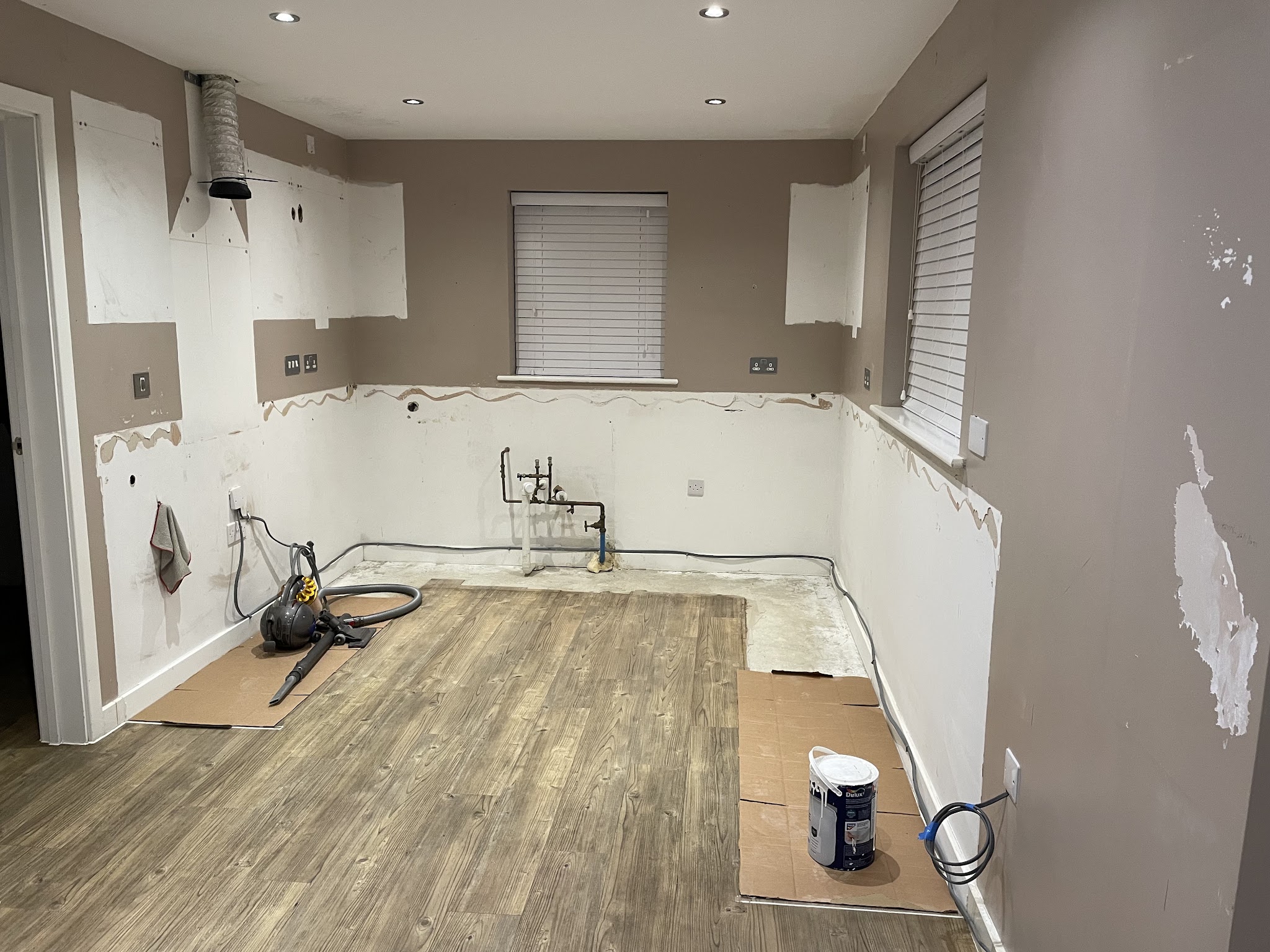 Before: the same room stripped back, ready for the new kitchen